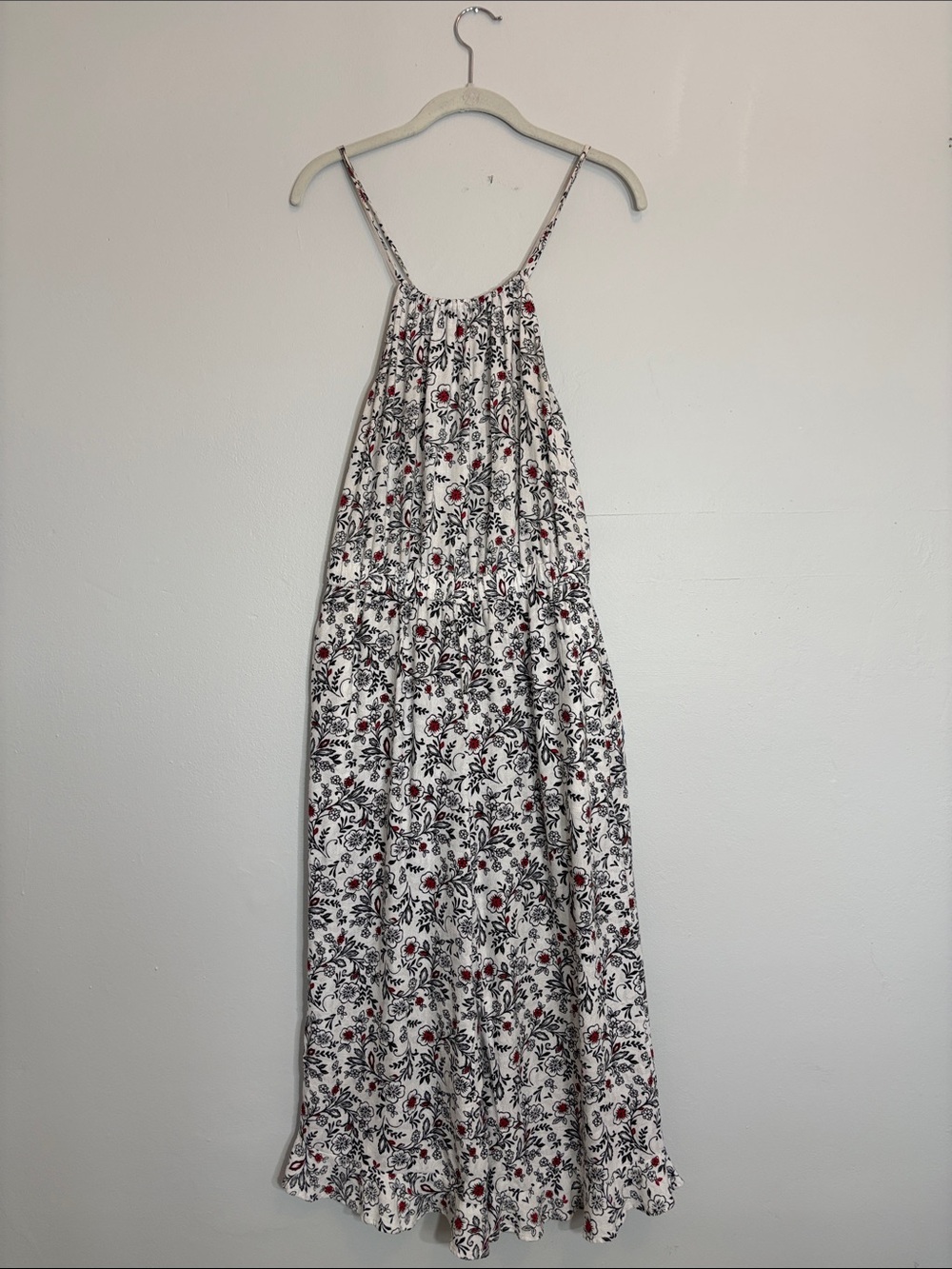 White and Black Flowy Jumpsuit with Red Floral Accents and Pockets